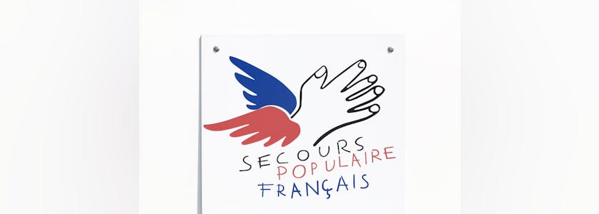 Grenoble, France – June 25, 2017: The Secours Populaire Francais or French Popular Relief, is a French non-profit organization dedicated to fighting poverty and discrimination in public life
