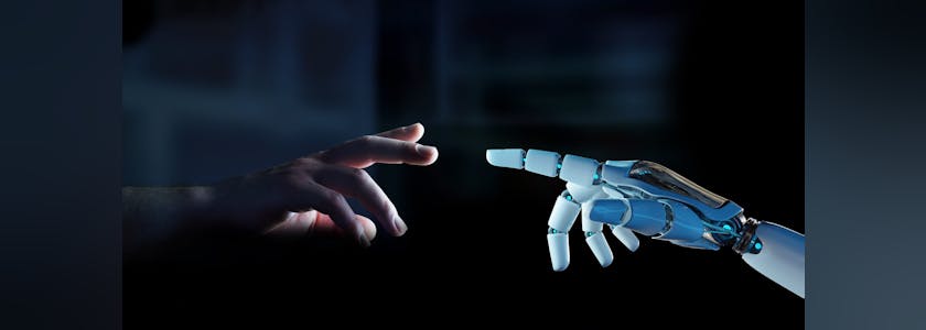 Le doigt d'un homme et doigt d'un robot