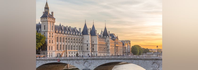 Dramatic sunset over river Seine and Conciergerie timelapse in Paris, France