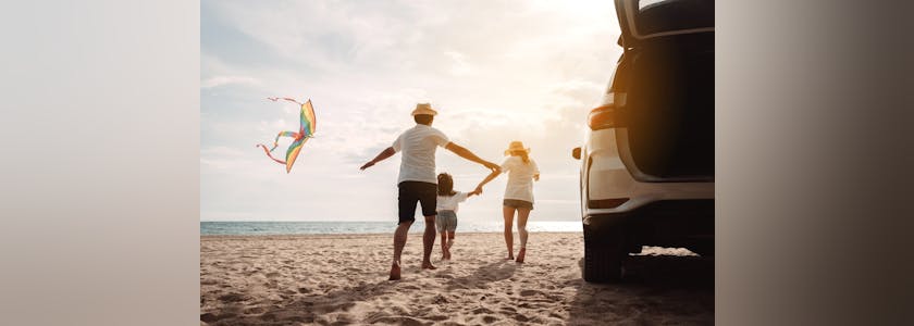 Family happy traveling enjoy in vacation with Car travel driving road trip summer vacation in car in the sunset, Dad, mom and daughter holidays and relaxation together get the atmosphere.